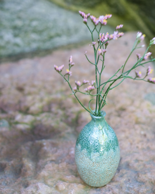 Knackad sticklingsvas grönmelerad