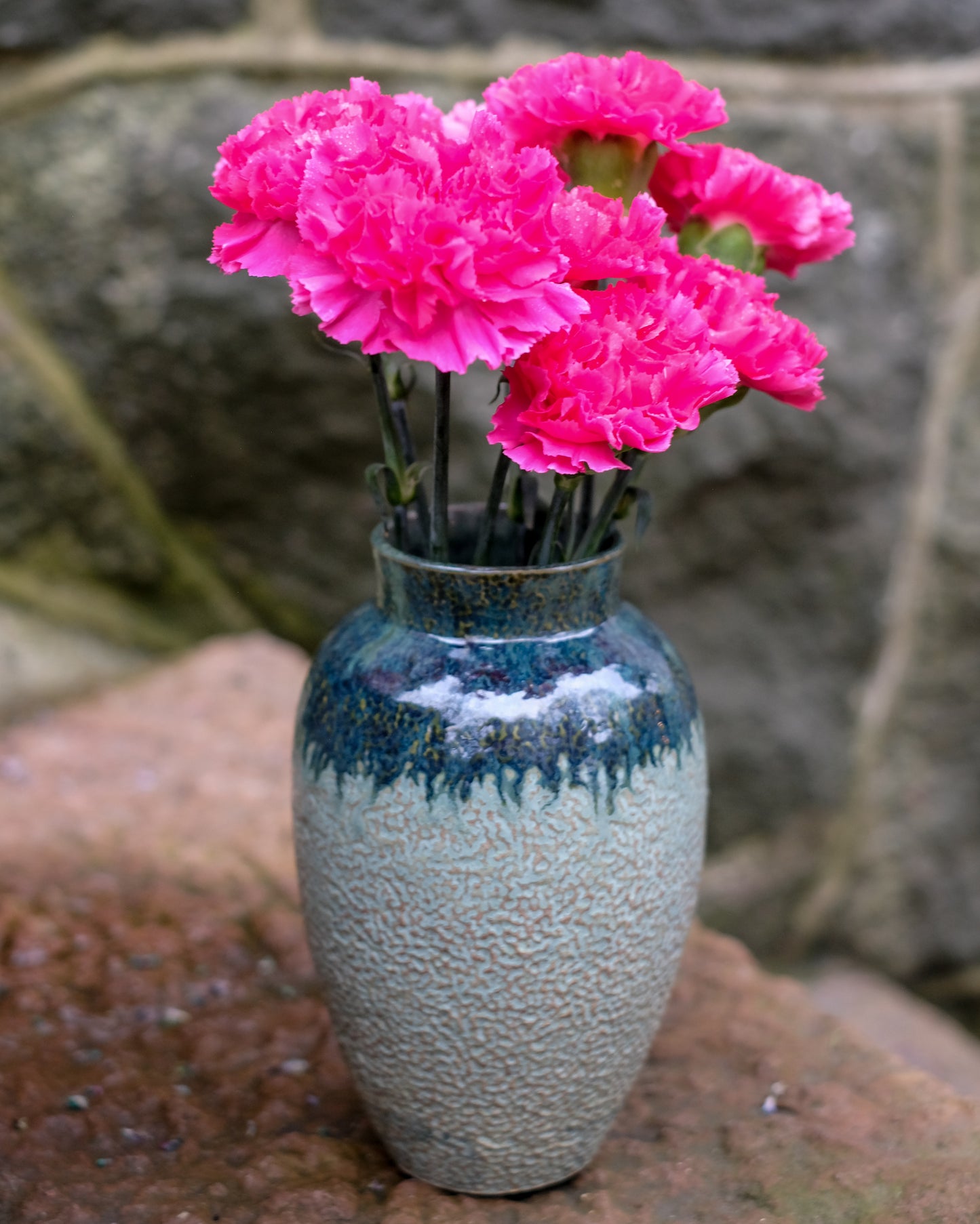 Grönmelerad knackad vas