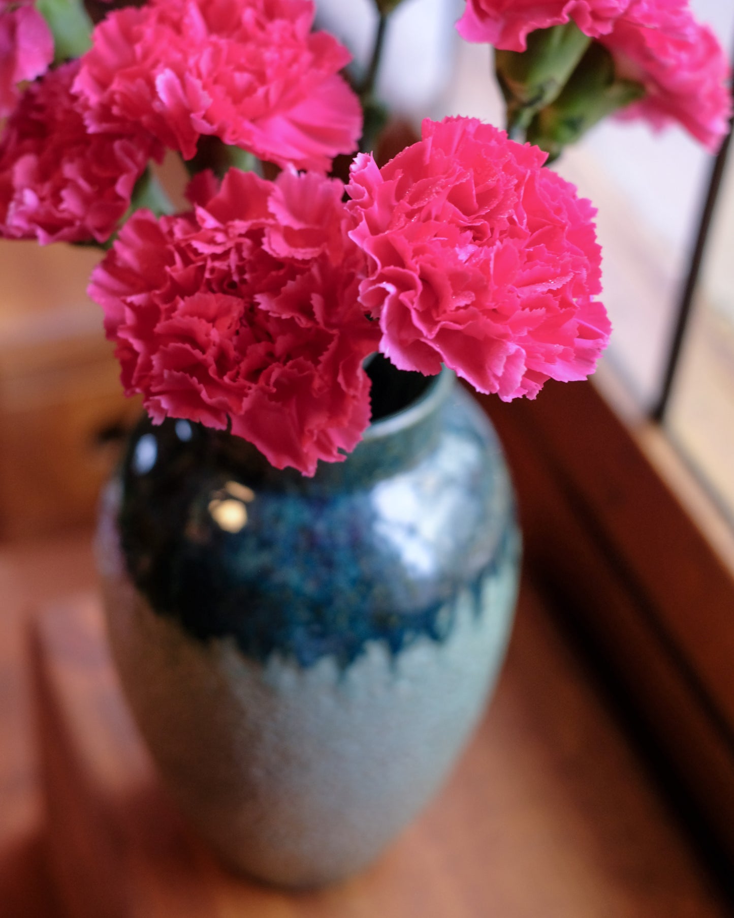 Grönmelerad knackad vas