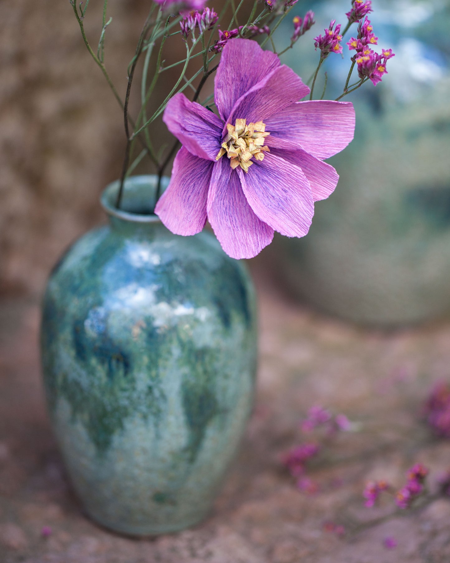 Knackad vas grönmelerad